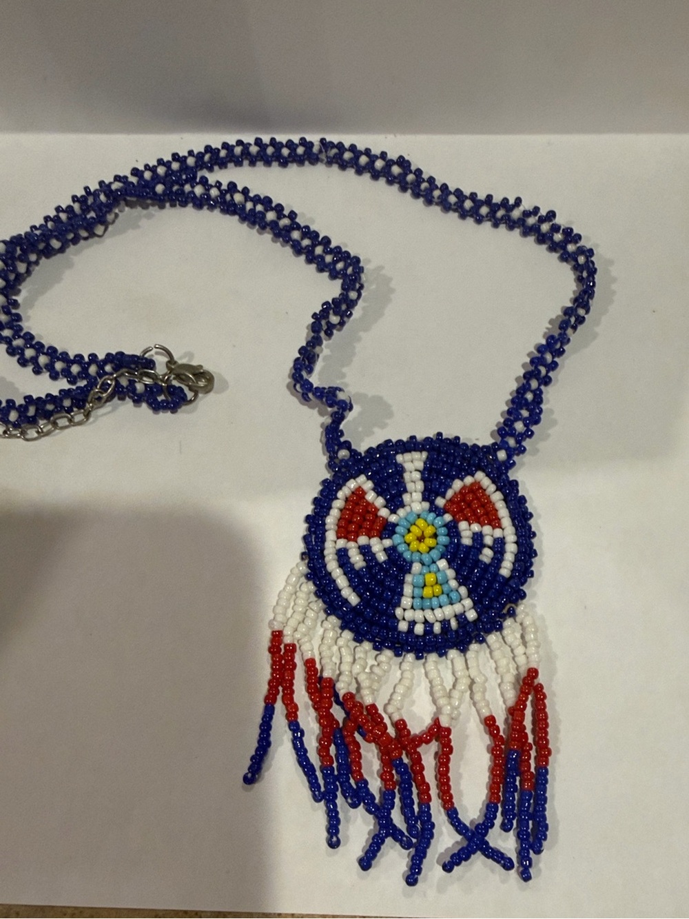 Handmade Blue Beaded Pendant Necklace with Red & White Fringe Accents